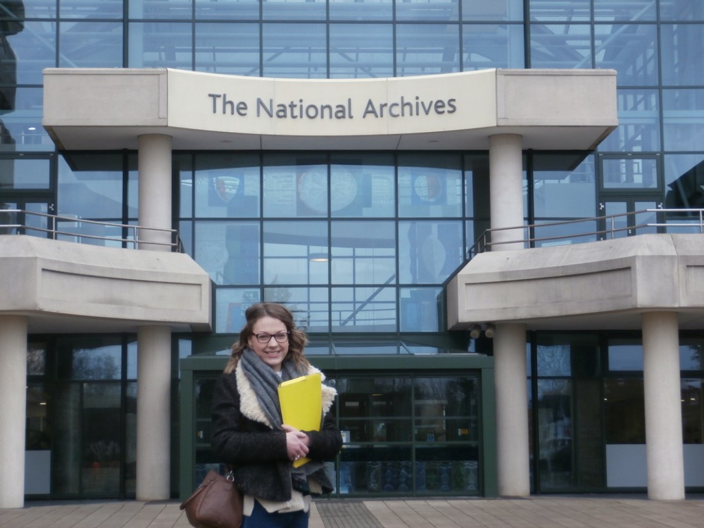 Picture of student Ellie standing at the entrance of The National Archives